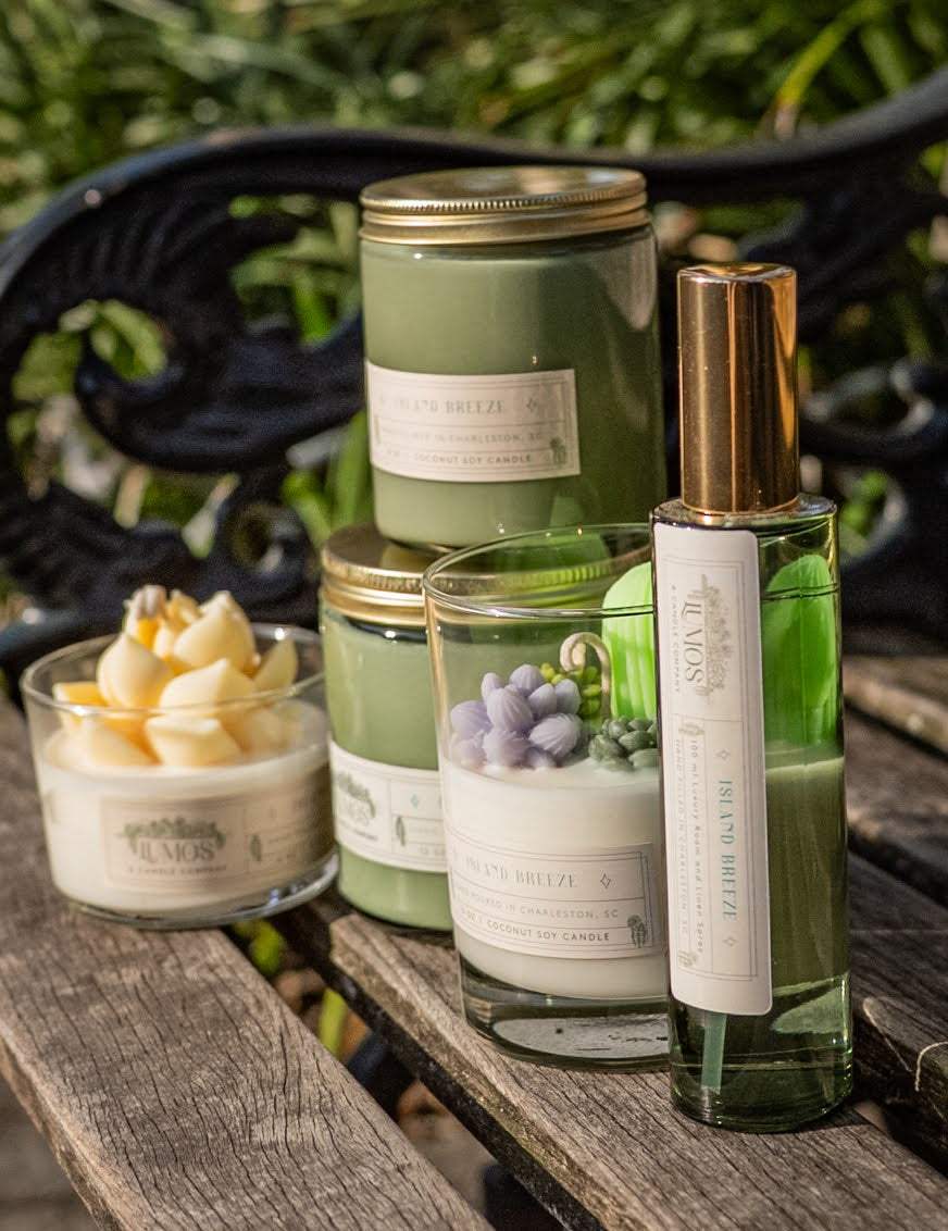 LUMOS Hand-Poured coconut soy candle in sage green glass with gold lid for luxury home fragrance