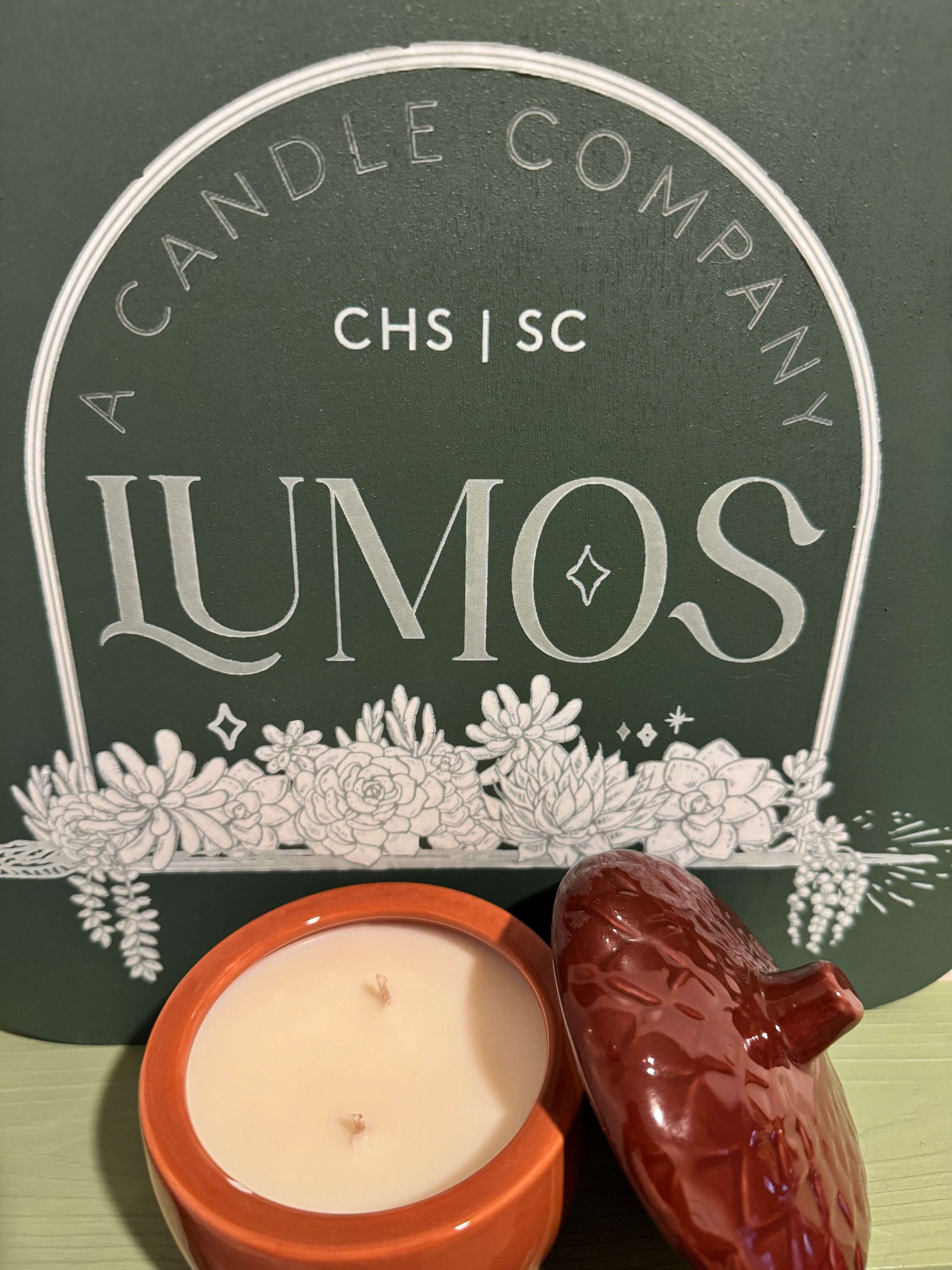 7oz fall scented candle in brown acorn ceramic vessel with lid, LUMOS limited edition autumn fragrance